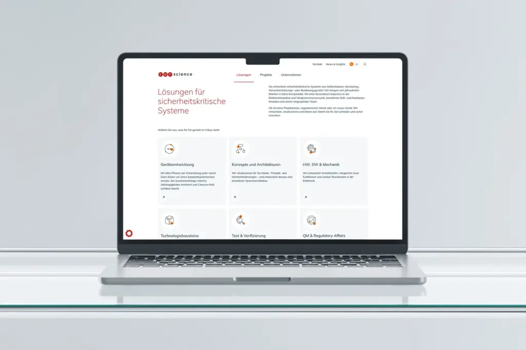 Referenzprojekt Corsience Corporate Design Relaunch Imagemotiv - Mockup - Laptop zeigt die Desktop-Ansicht der Landingpage im Bereich Lösungen.